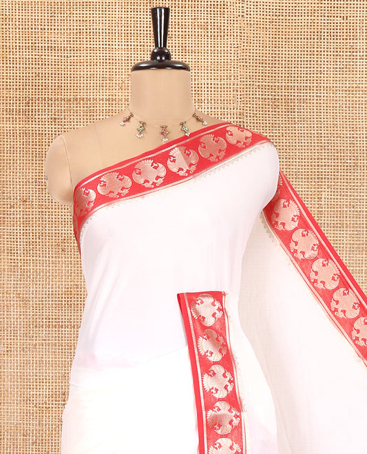 Off-white Plain Semi-Mysore Silk Saree, Complemented by a Contrast Border of Ganda Berunda Designs, Zari Striped Pallu, and Paired with a Contrast Blouse