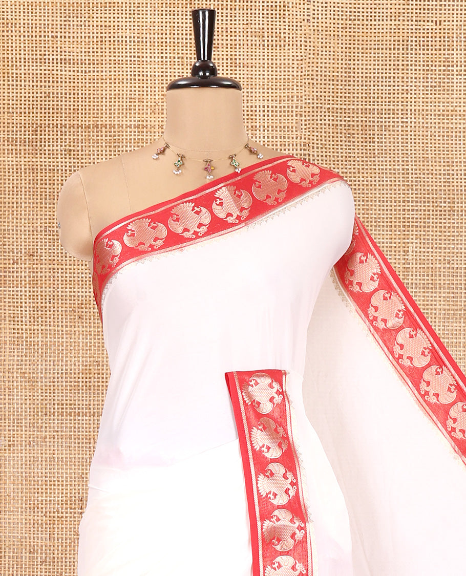 Off-white Plain Semi-Mysore Silk Saree, Complemented by a Contrast Border of Ganda Berunda Designs, Zari Striped Pallu, and Paired with a Contrast Blouse
