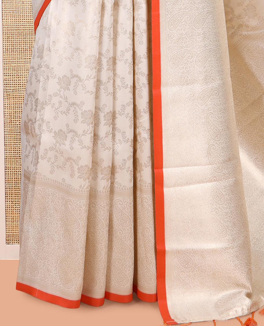 Off-White-Orange Semi-Silk Saree, Adorned with Floral Jacquard Design, a Zari Paisley Border, and a Contrast Blouse