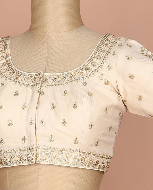 Cream floral thread embroidered round neck elbow sleeve raw silk readymade blouse