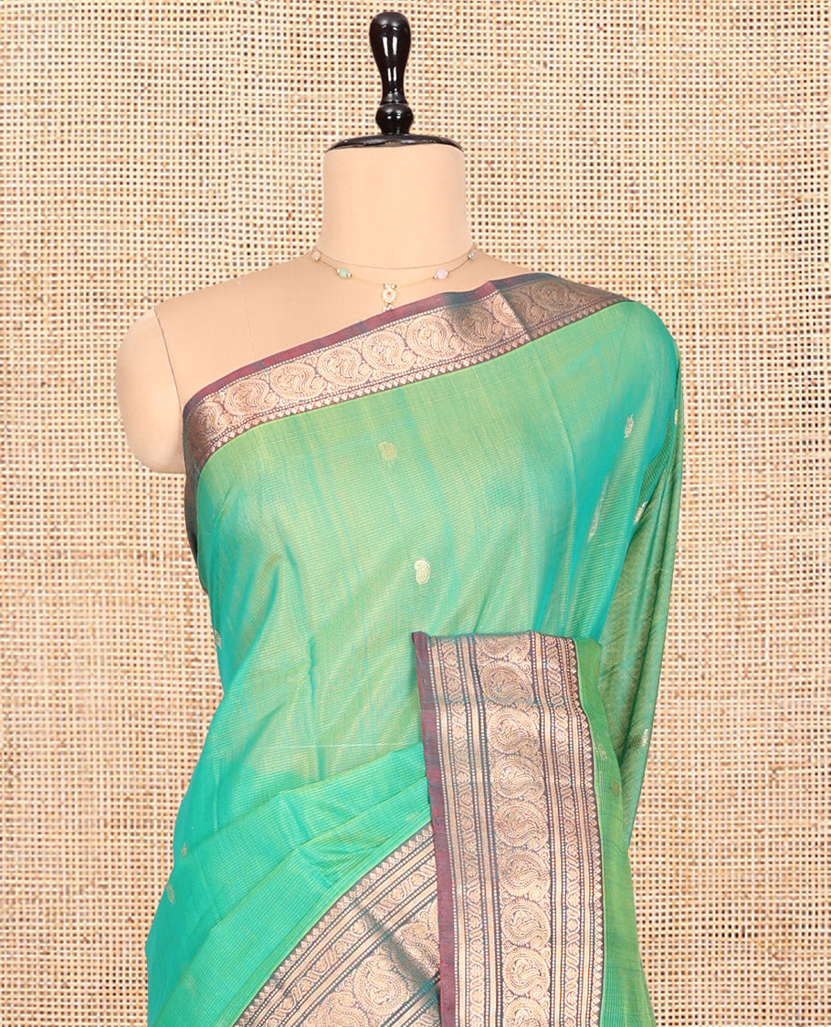 Sea Green Silk Cotton Saree, Elevated with Buttas, Complemented by Contrast Traditional Paisley Zari Design Border, Zari-Decked Pallu, and a Contrast Blouse