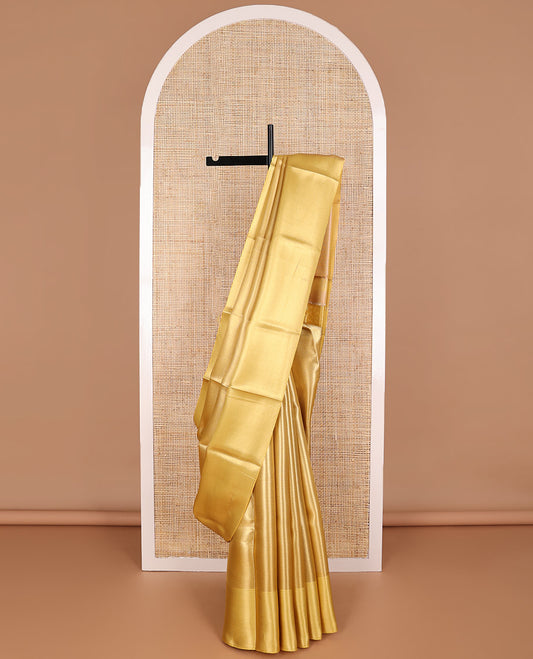 Yellow chevron design tissue saree with contrast striped border & zari design pallu