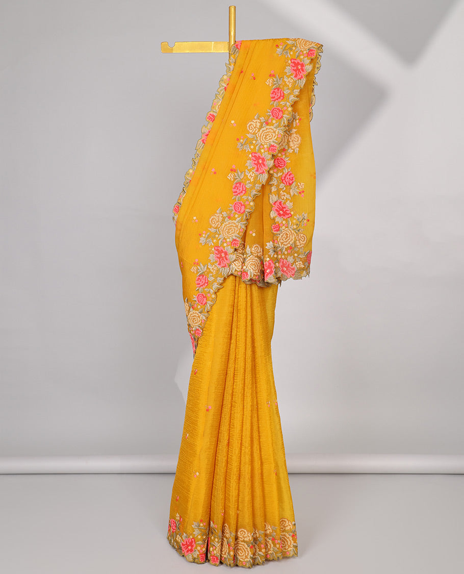 Yellow crushed tissue saree with scallop floral border & motif embroidery pallu