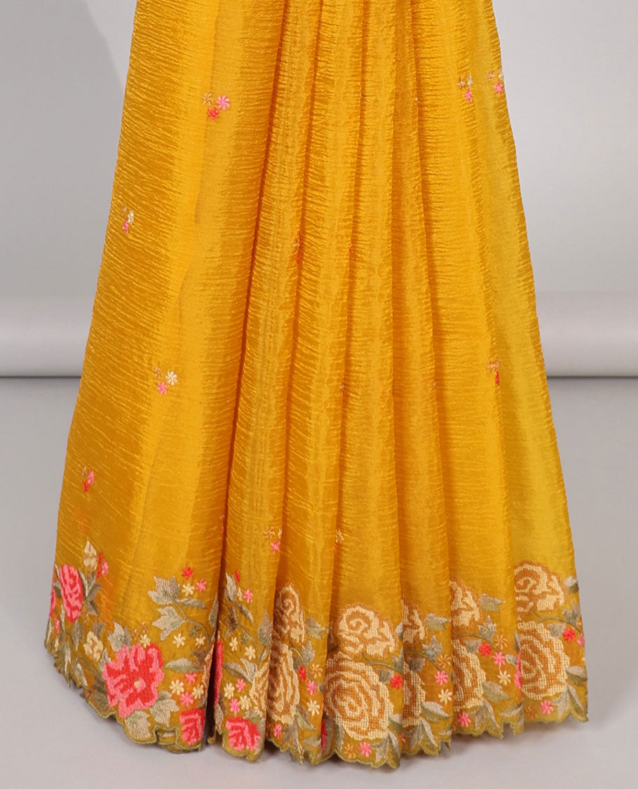 Yellow crushed tissue saree with scallop floral border & motif embroidery pallu