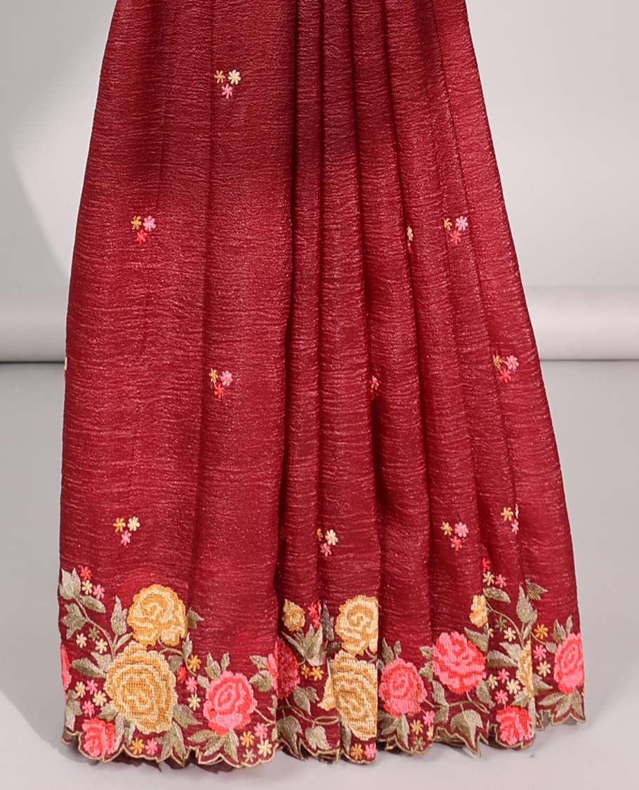 Maroon crushed tissue saree with all over floral motifs & floral scallop border