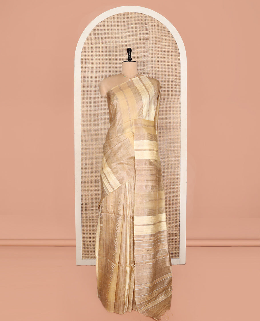 Sandal Tussar Silk Saree, Gleamed Up with Zari Stripes, a Subtle Border, Pallu of Stripes, and a Matching Blouse