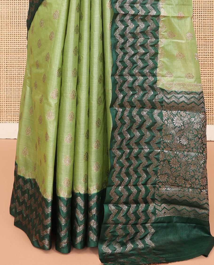Green Tussar Silk Saree, Woven with Zari Buttas, a Contrast Chevron Zari Design Border, Floral Design Pallu, and a Contrast Blouse