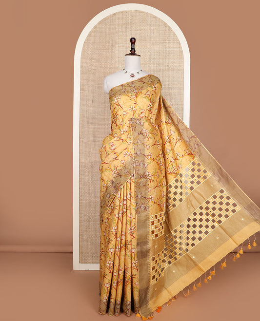 Yellow floral vine printed tussar silk saree, thilakam motifs border, and checked pallu