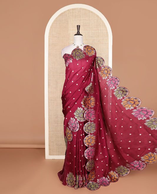 Maroon Matka silk saree features rudraksham motifs, scallop floral motifs and bird embossed thread embroidery border