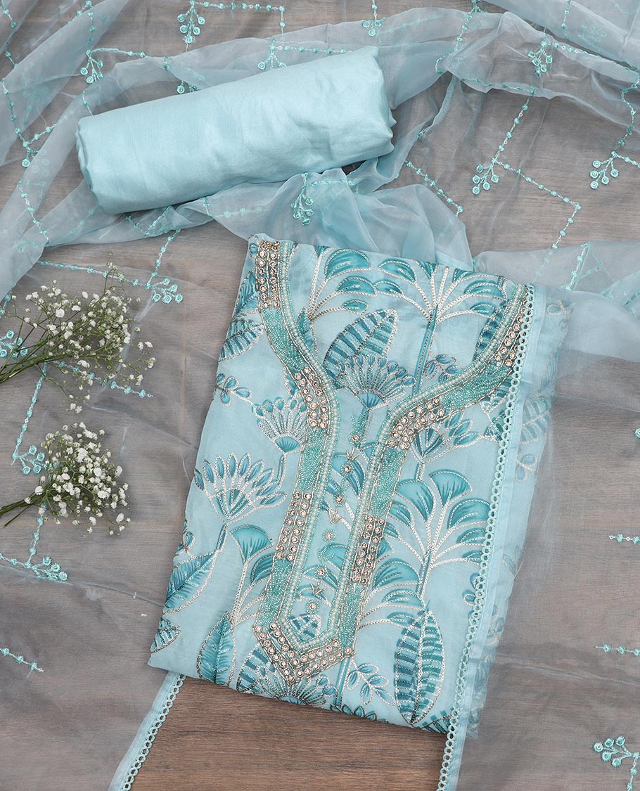 Light blue material chudidar set, tropical printed with neck embroidered top, plain bottom, and thread embroidered dupatta