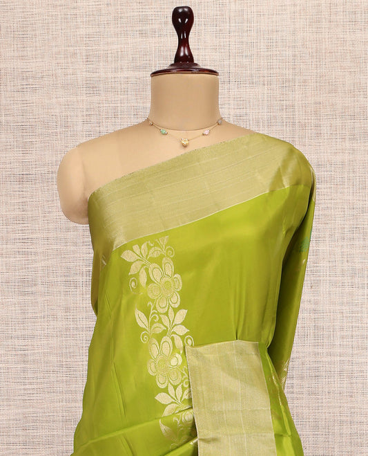Green Uppada Saree, Elevated with Floral Zari Buttas, a Bavanji Border, Grand Jaal Pallu, and a Contrast Blouse