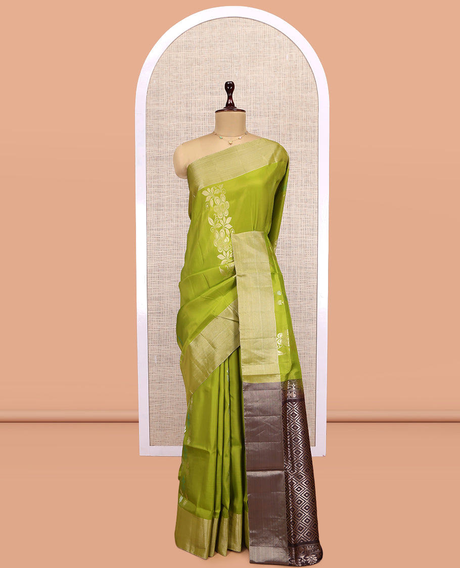 Green Uppada Saree, Elevated with Floral Zari Buttas, a Bavanji Border, Grand Jaal Pallu, and a Contrast Blouse