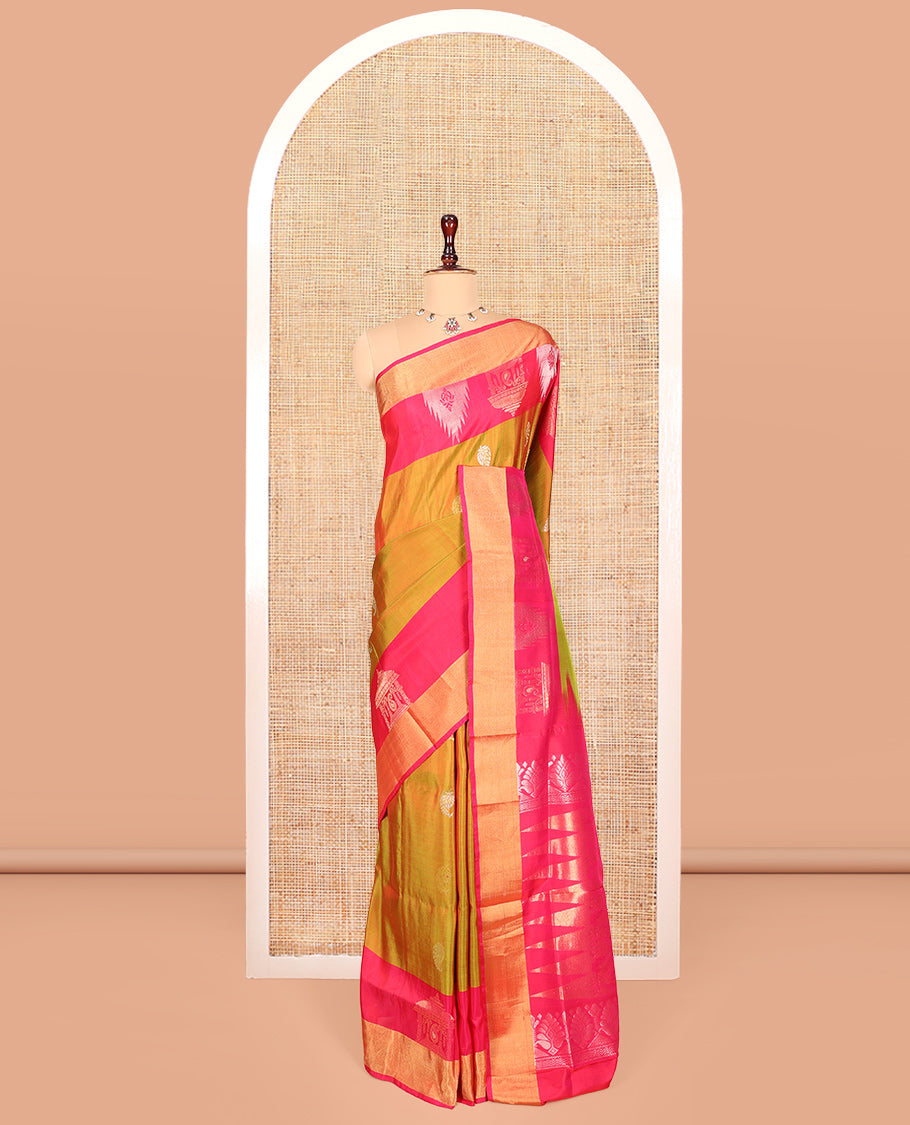 Mustard Uppada Silk Saree, Embellished with Buttas, a Contrast Temple and Gopuram Border, Pallu of Temple and Floral Designs, and a Contrast Blouse