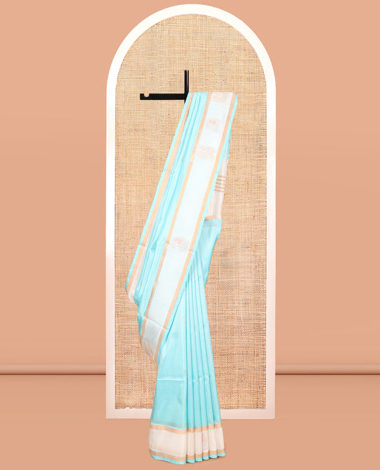 Blue Uppada Silk Saree, Subtly Sparkled with Zari Buttas, Complemented By Contrast Peacock Zari Border, Pallu of Paisley and Peacock Buttas, and a Contrast Blouse