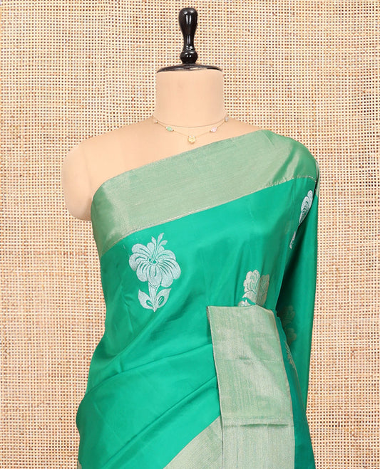 Green Semi Uppada Saree, Adorned with Hibiscus Floral Buttas, a Bavanji Border, Contrast Intricate Pallu, and a Contrast Blouse