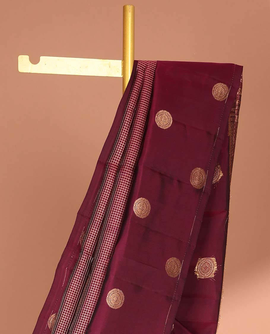 maroon checked vasundhara elite silk saree with self round buttas border & intricate zari design pallu