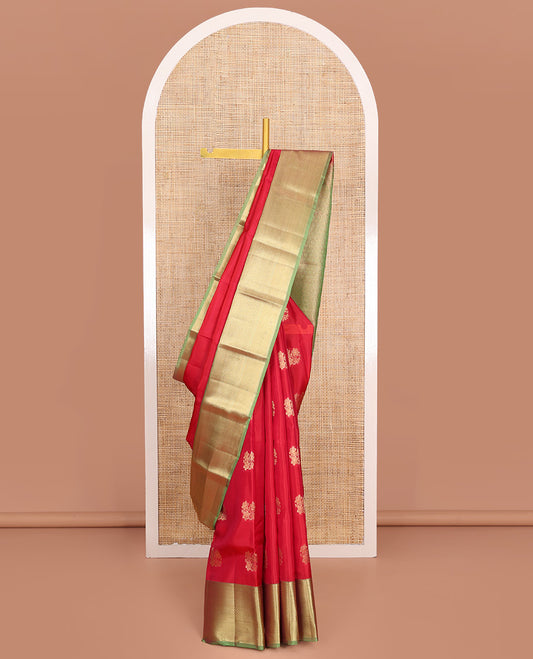 Red Vasundhara Lite-Silk Mix Saree, Prettified with Floral Zari Buttas All Over Its Body, Complemented by a Contrast Border Featuring Rekku, Kathir, Ara Maadam, and Hexagon Designs, Grand Pallu of Geometric Patterns, and Paired with a Contrast Blouse