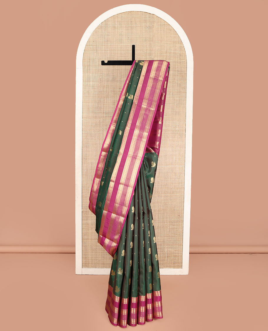 Green Vasundhara Lite Silk Mix Saree, Graced with Mayil Buttas All Over Its Body, Complemented by a Contrast Border of  Neli, Muthu, and Chakram Designs, Pallu Steeped with Traditional Designs, and Paired with a Contrast Blouse