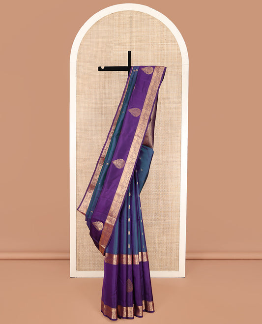 Blue Vasundhara Lite Silk Mix Saree, Ornamented with Zari Buttas on Its Body, Complemented by a Contrast Border of Thilakam, Kamalam, and Mayil Designs, Grand Jaal Pallu, and Paired with a Contrast Blouse