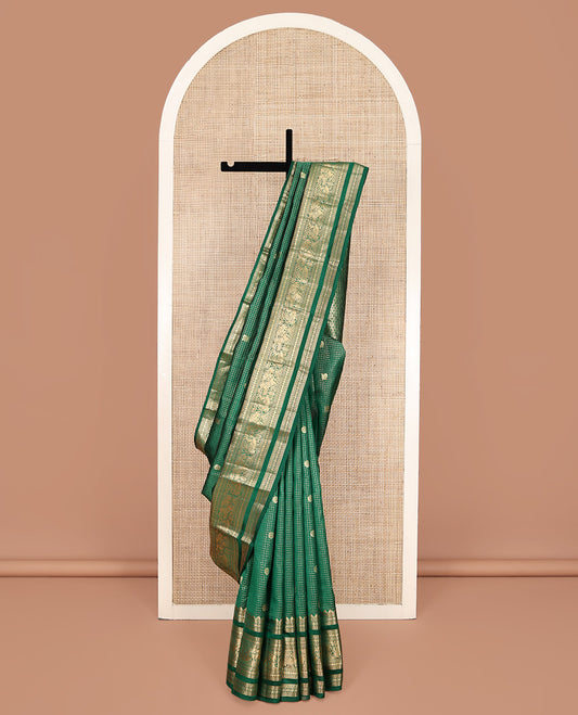 Green Vasundhara Lite Silk Mix Saree, Adorned with Mayil-Chakram Buttas and Zari Checks On Its Body, Highlighted by Zari Border of Rekku, Rudraksham, Mayil, and Kuthirai Designs, Grand Jaal Pallu and Paired with a Matching Blouse