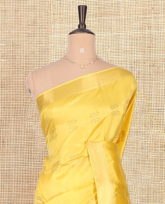 Yellow Banana Pith Saree, Subtly Sparkled with Buttas, a Zari Temple Border, Striped Pallu, and Matching Blouse