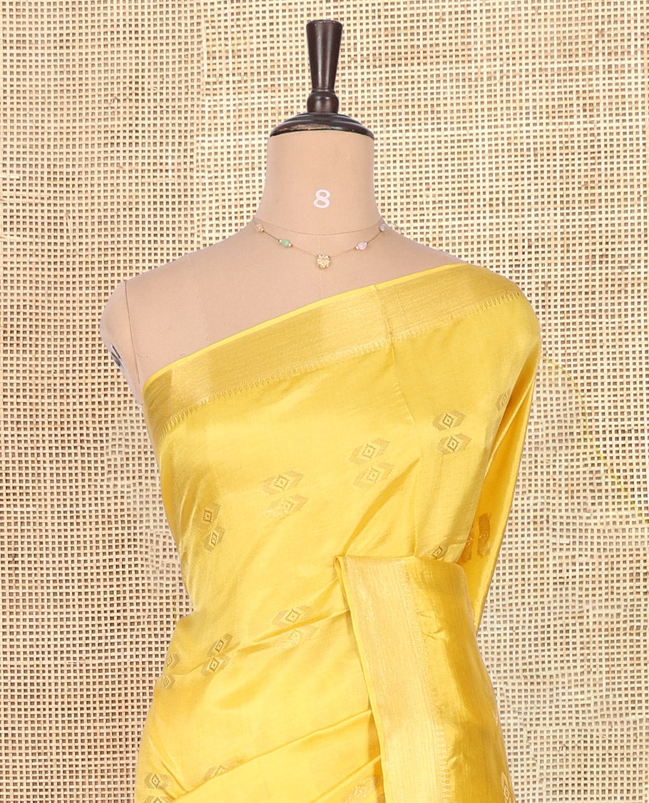 Yellow Banana Pith Saree, Subtly Sparkled with Buttas, a Zari Temple Border, Striped Pallu, and Matching Blouse