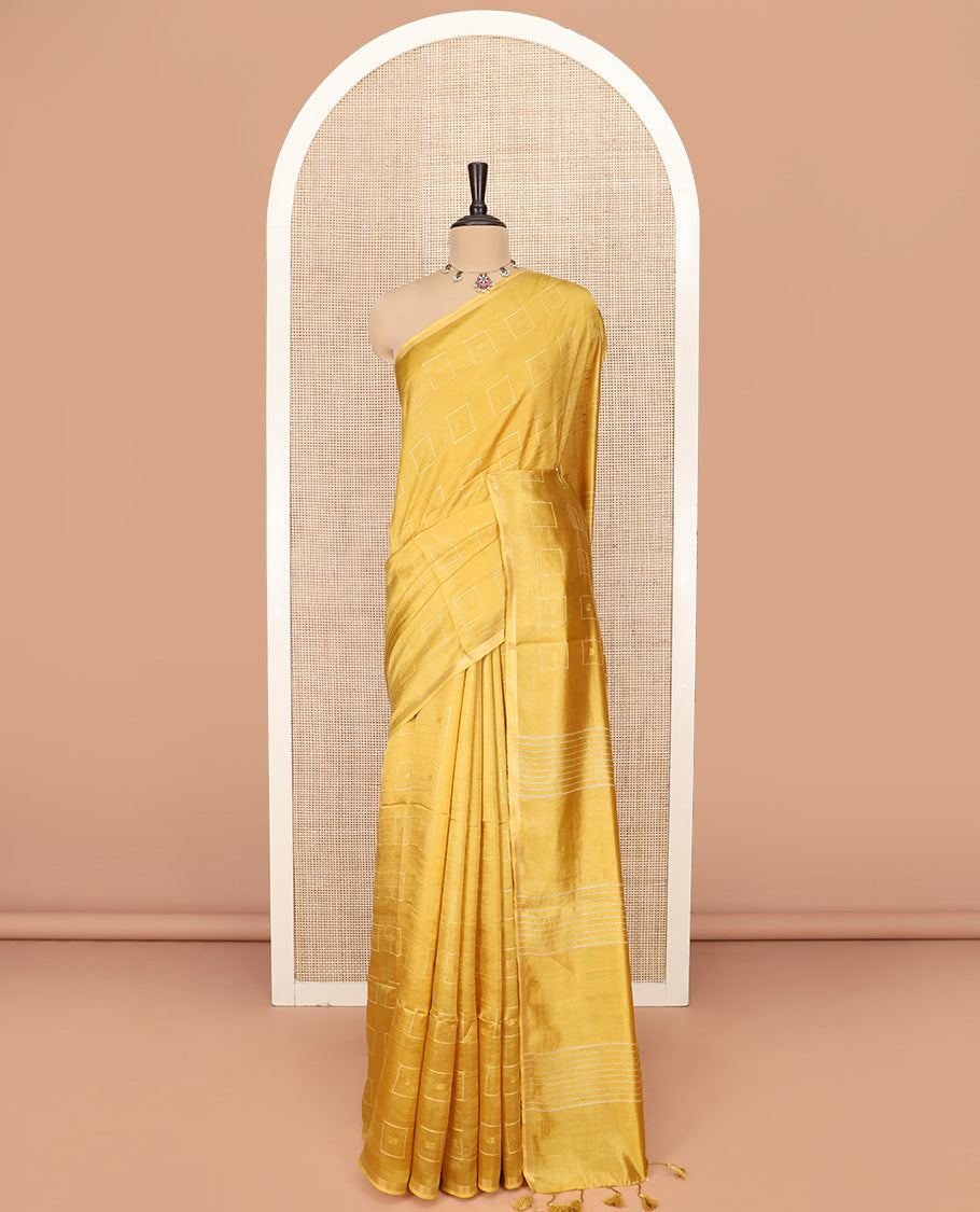 Yellow Banana Pith Saree Adorned with Butta Enclosed Squares, Subtly Sparkled with Piping Border, Striped Pallu, and Paired with a Matching Blouse