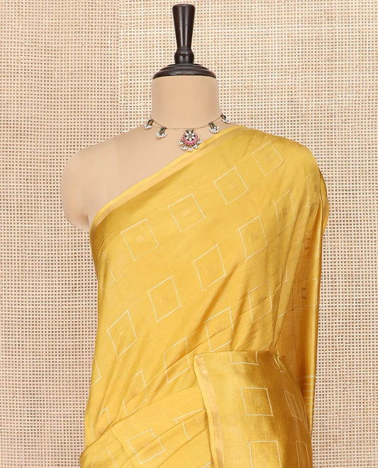 Yellow Banana Pith Saree Adorned with Butta Enclosed Squares, Subtly Sparkled with Piping Border, Striped Pallu, and Paired with a Matching Blouse