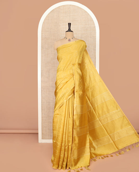 Yellow Banana Pith Saree Adorned with Butta Enclosed Squares, Subtly Sparkled with Piping Border, Striped Pallu, and Paired with a Matching Blouse