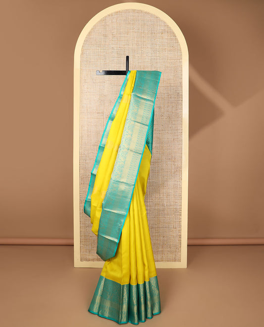 Yellow buttas silk saree with contrast zari design border & floral jaal design pallu