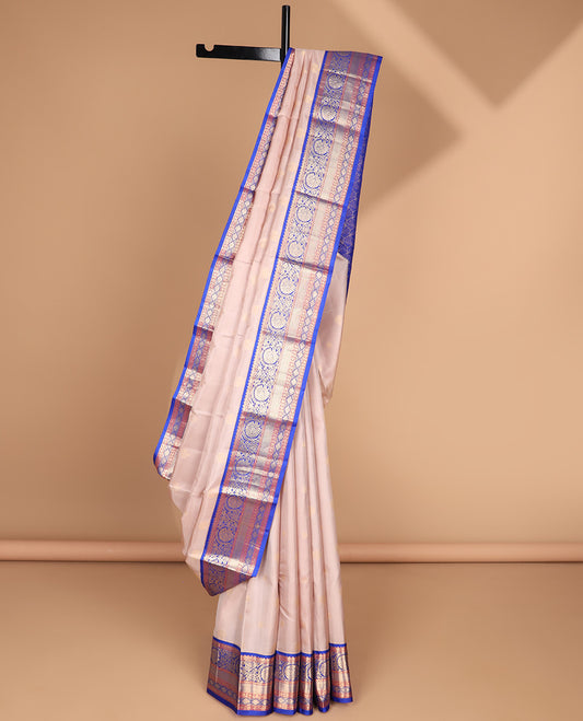 Baby pink buttas silk saree with contrast border of rekku, banaras , muthu, kodi visiry, paun designs & zari design pallu