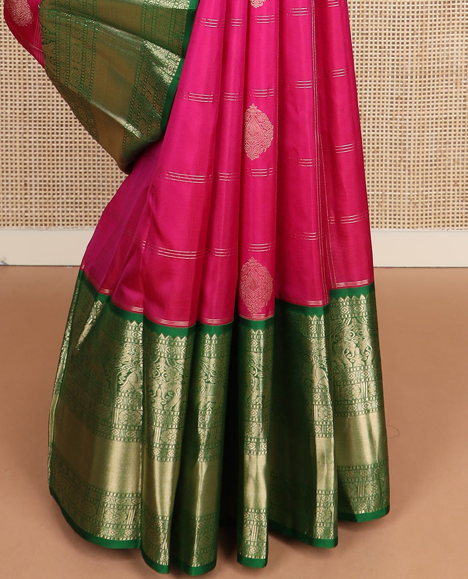 Dark pink zari buttas and checked silk saree, contrast border of rekku, muthu, diamond, yaanai, and chakram designs, and floral jaal pallu