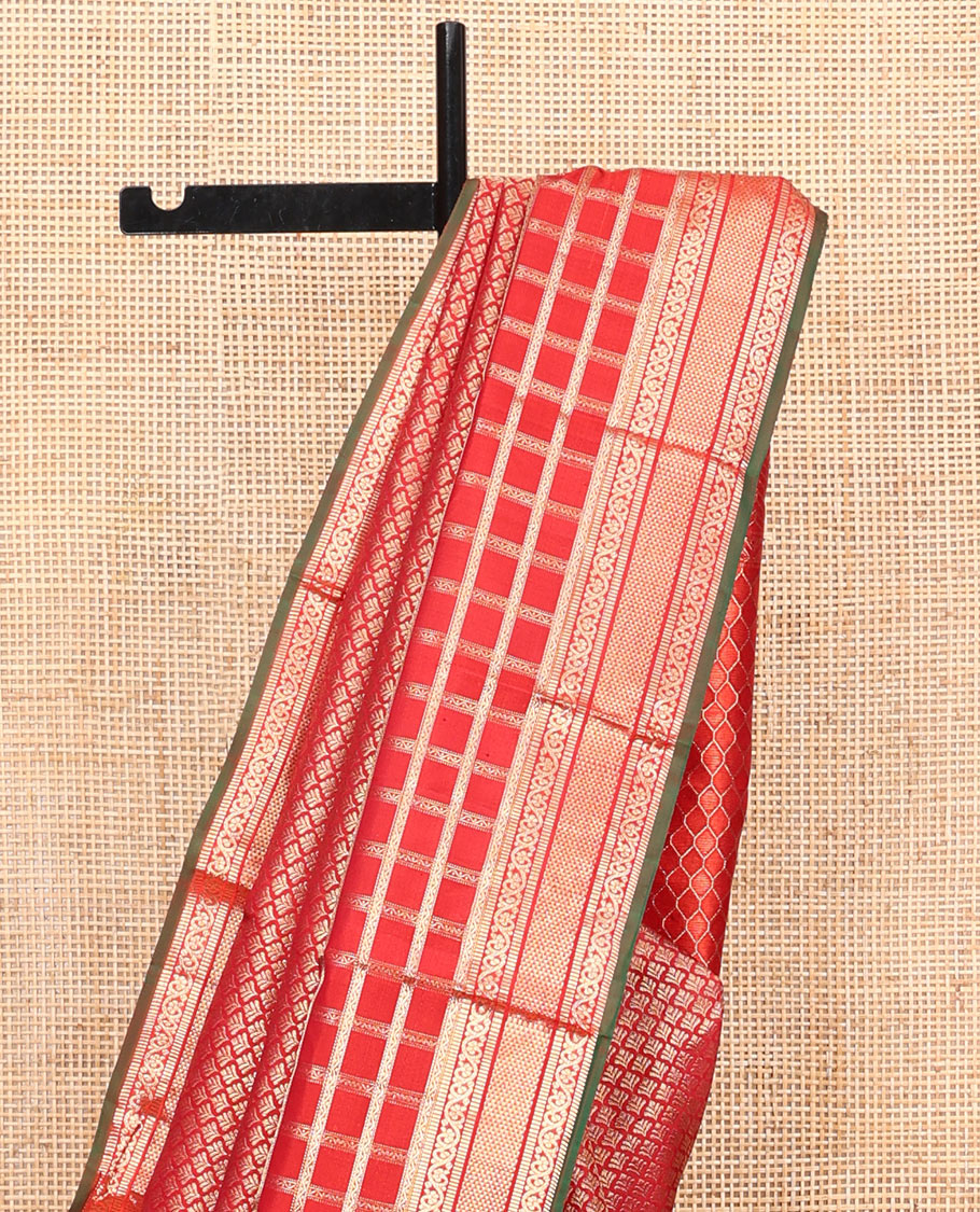 Red Kanchipuram Wedding Silk Saree, Delicately Woven with Jacquard Design on Its Body, Highlighted by Zari Border of Annam, Chakram, Neli, Muthu, Kodi Visiry, and Ara Maadam Designs, Grand Pallu of Vanki Designs, and Paired with a Contrast Blouse