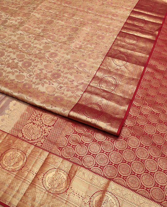 Sandal floral jaal jacquard Kanchipuram wedding silk saree, contrast border of thilakam mokku, rudraksham, diamond, and chakram motifs, and pallu steeped with chakram buttas