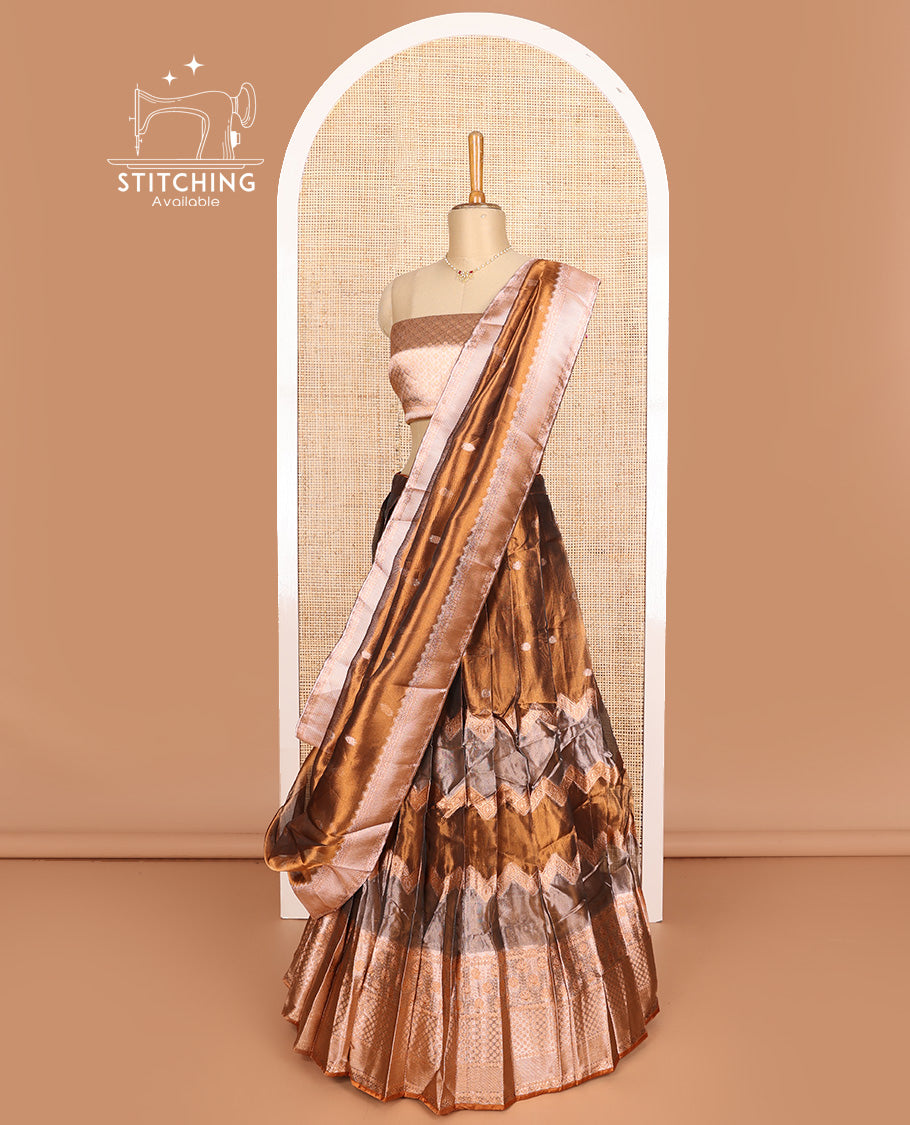 Brown art silk half-saree, buttas, and chevron design with traditional motifs border skirt, brocade blouse, traditional motifs thread woven dhavani, and detachable belt