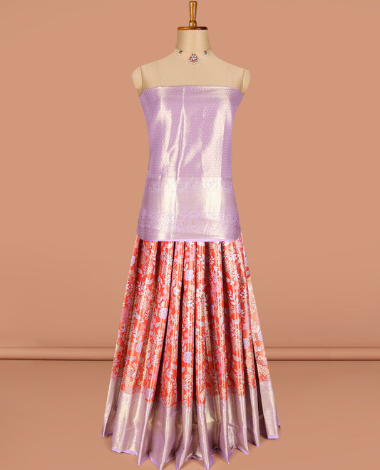 Bright red art silk half-saree pavadai material, floral jacquard with contrast traditional border skirt, jacquard blouse, and zari design dhavani