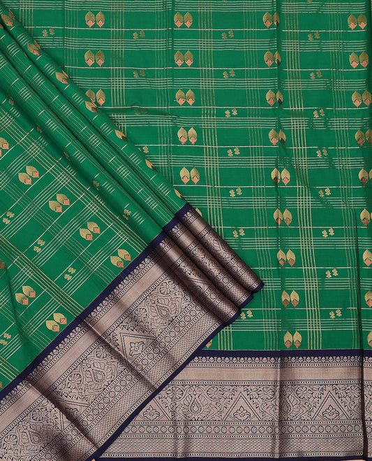 Green art silk pavadai set, zari design with contrast traditional zari bordered skirt and a contrast zari design blouse