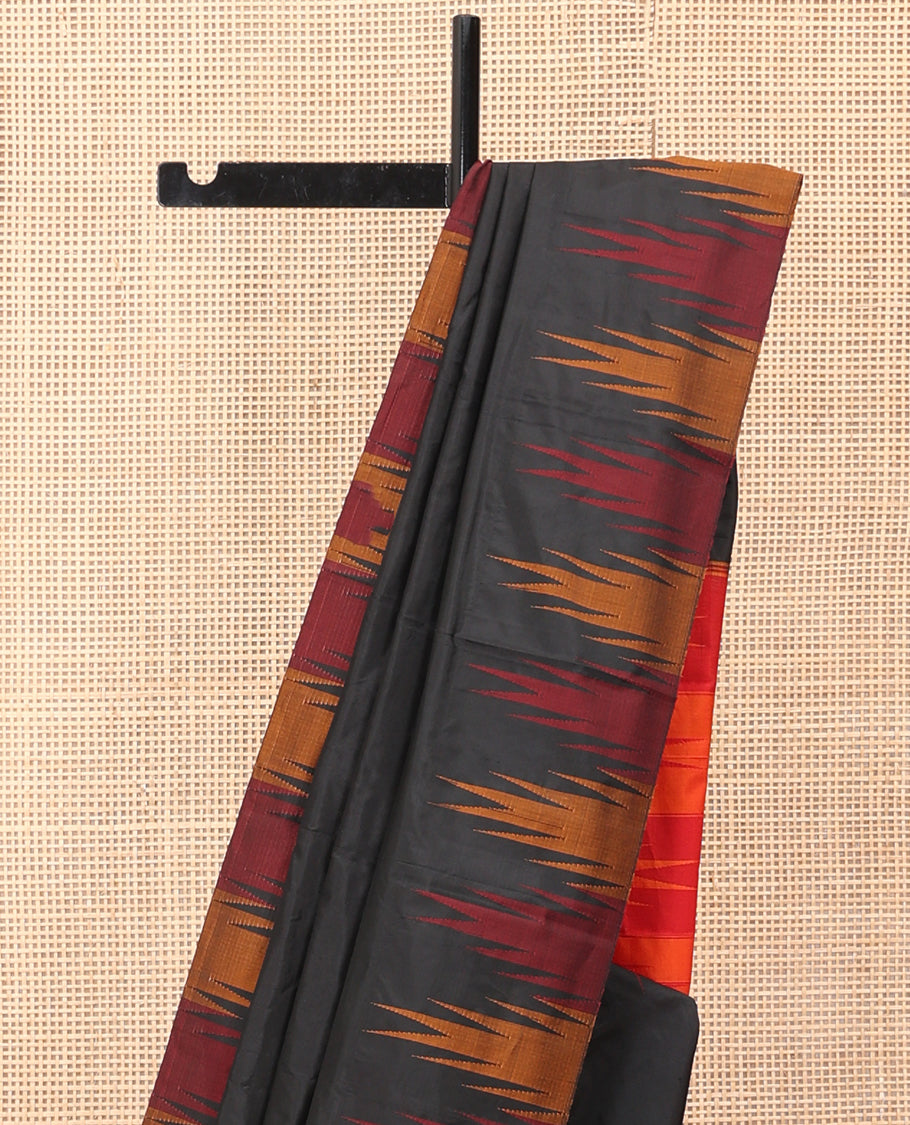 Black Plain Bangalore Silk Saree, Complemented by a Contrast Temple Border, Striped Pallu, and a Contrast Blouse