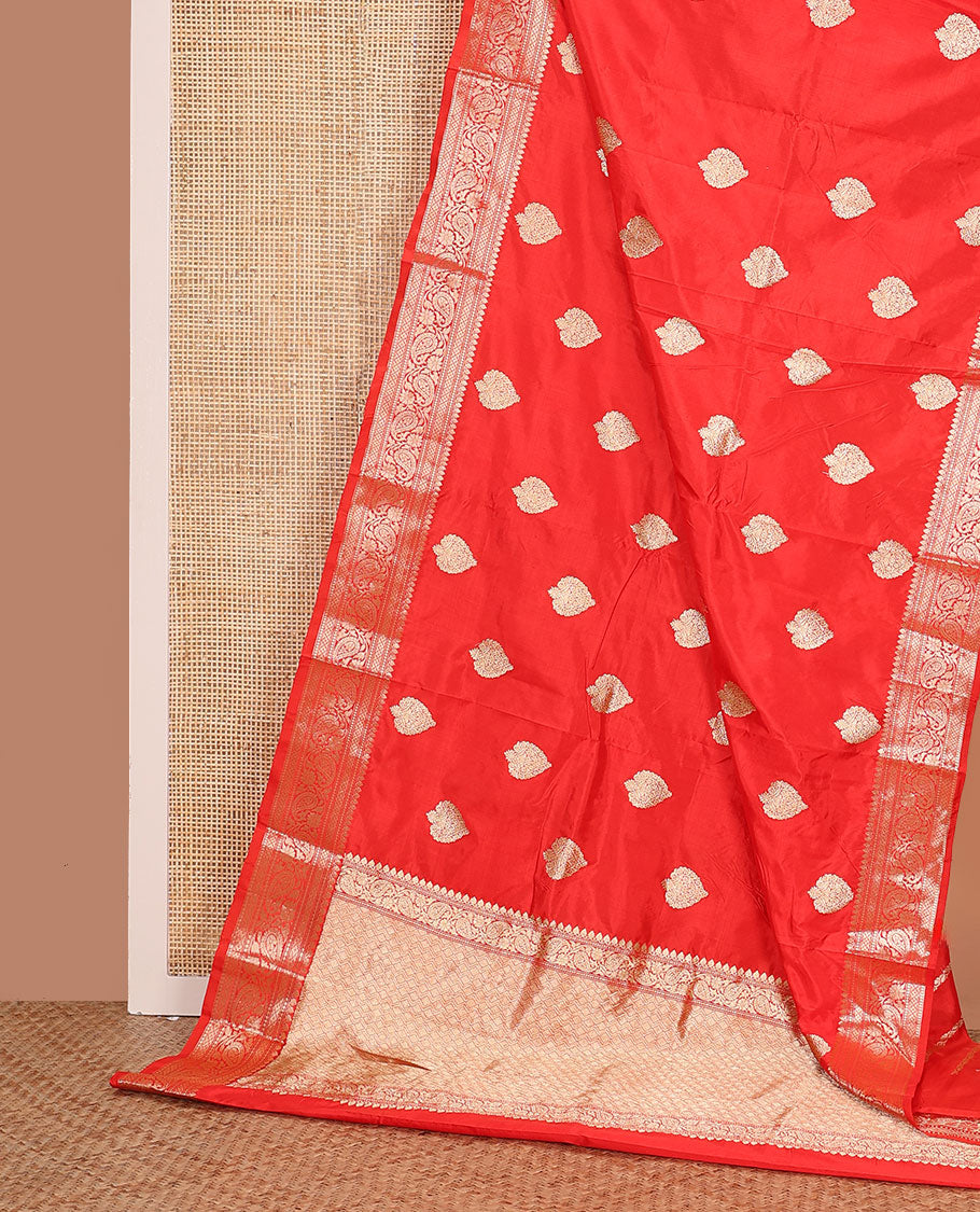 Red zari buttas kathan silk saree, traditional border of paisley creeper designs, and jaal pallu
