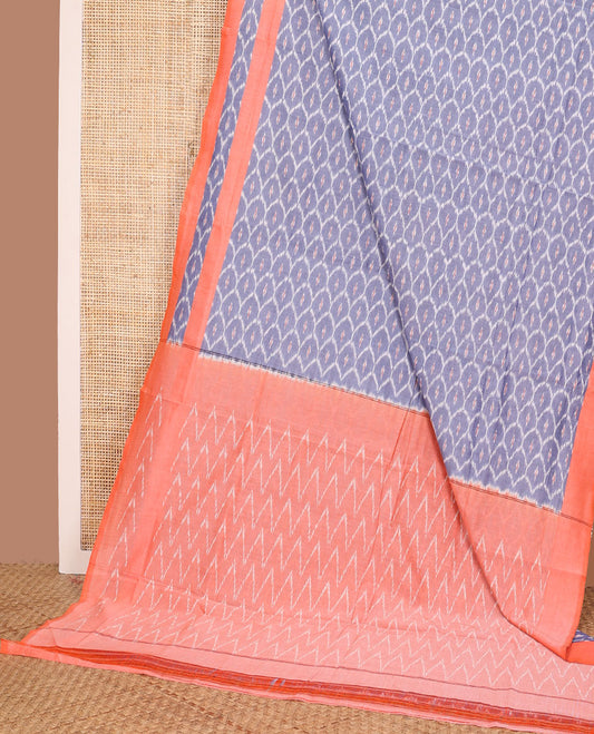 Blue ogee patterned ikkat cotton saree, contrast ikkat woven border, and chevron striped pallu