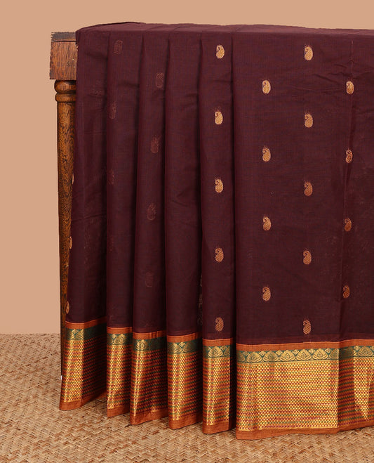 Maroon paisley buttas Venkatagiri cotton saree, contrast traditional zari border, and pallu of zari stripes and paisley buttas