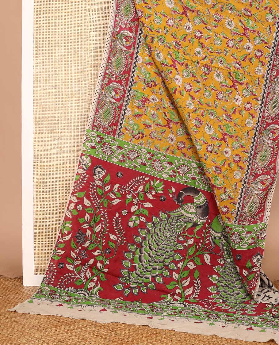 Mango yellow floral vine and deer motifs machine-printed Kalamkari cotton saree, contrast peacock motif printed border, and pallu of floral and peacock print