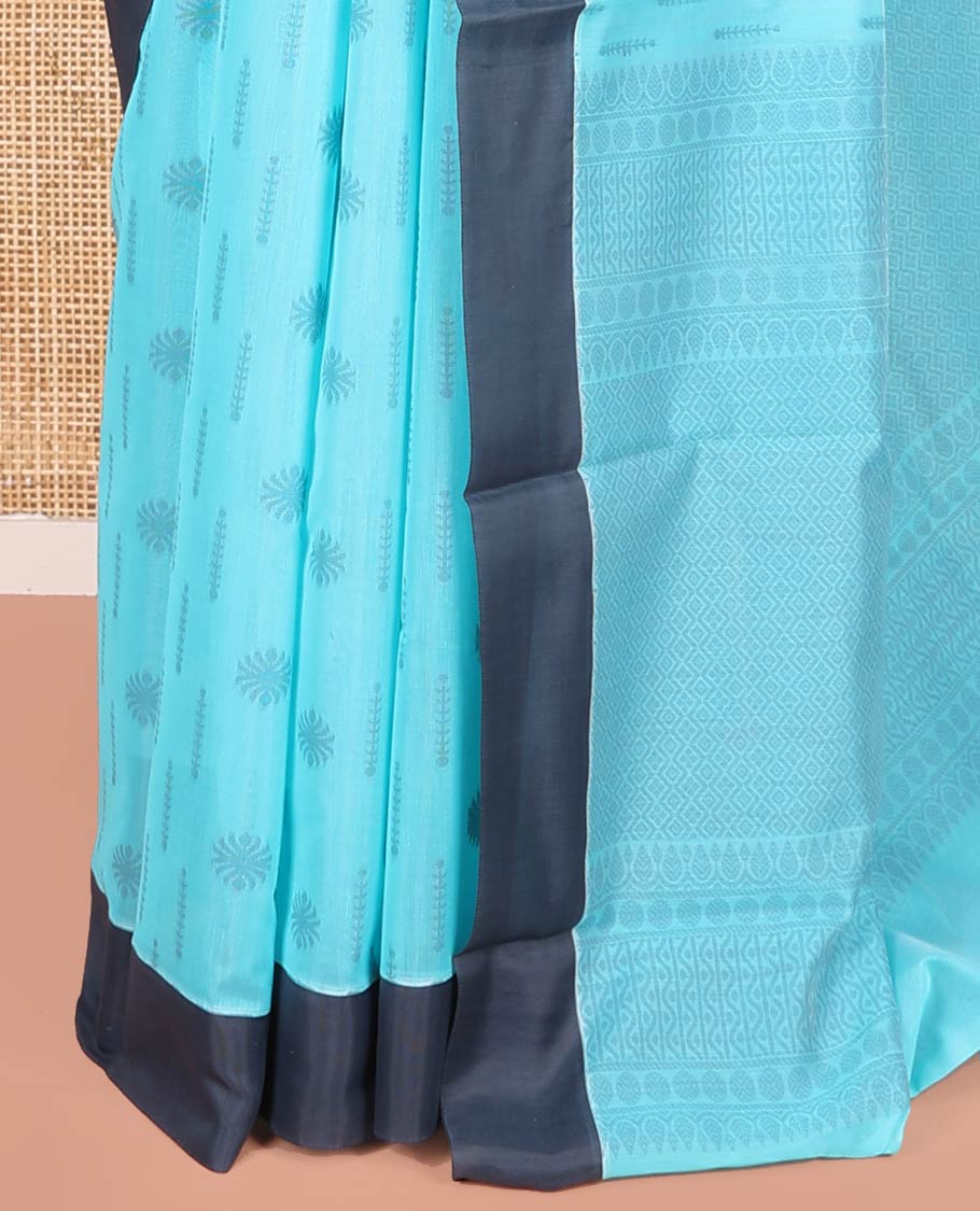 Blue Semi-Silk Cotton Saree, Subtly Adorned with Buttas on Its Body, Complemented by Contrast Border, Sparsely Designed Pallu of Geometric Designs, and Paired with a Matching Blouse