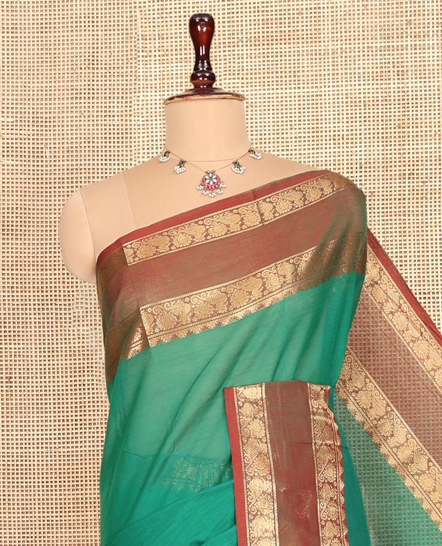 Green  Plain Chettinad Cotton Saree, Complemented by a Contrast Rettai Pettu Peacock Zari Border, Striped Pallu, and a Matching Blouse