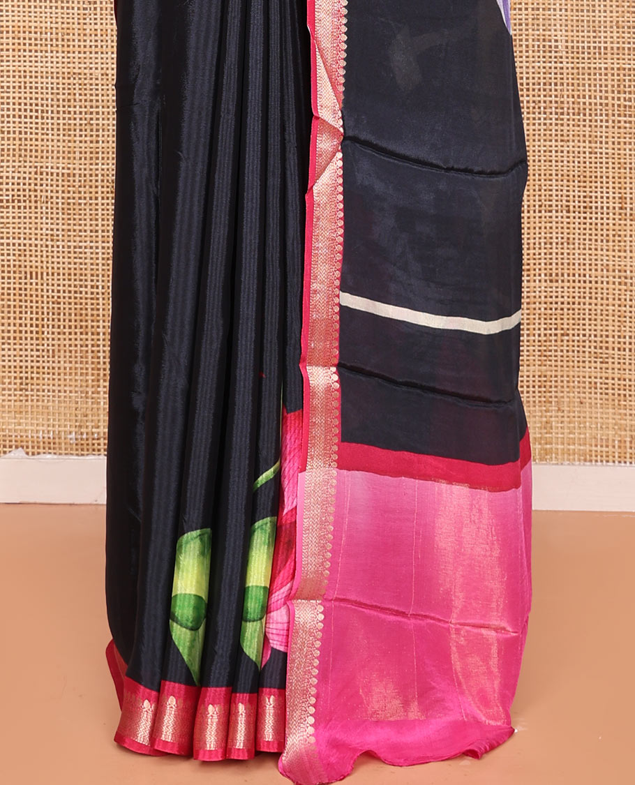 Black Georgette Saree Highlighted with Unique Print, Complemented by a Contrast Traditional Zari Border, Pallu Gleamed Up with Zari, and Paired with a Contrast Buttas Woven Blouse