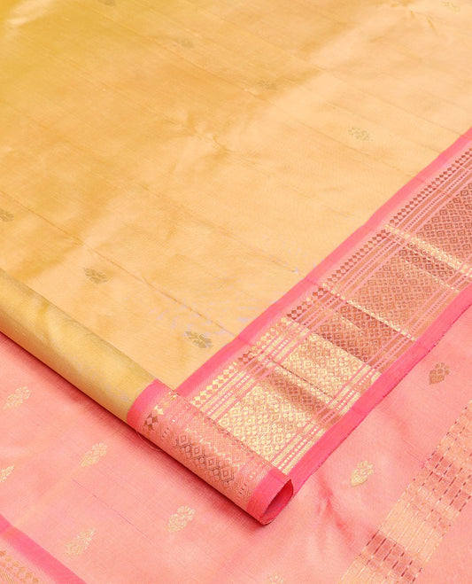 Yellow zari buttas Kanchipuram silk saree, contrast one-sided border of paneer sombu, banaras, muthu, and jaal designs, and zari design pallu