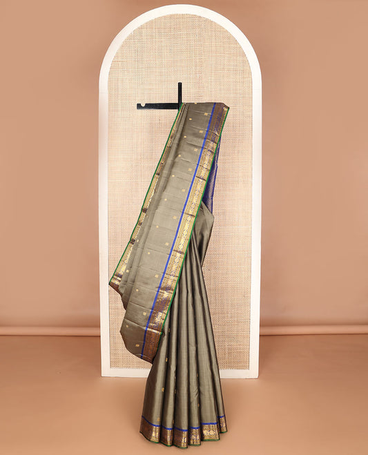 Grey mayil chakram buttas silk saree, contrast border of thilakam mokku,banaras,neli,yaanai & manga & pallu of intricate designs