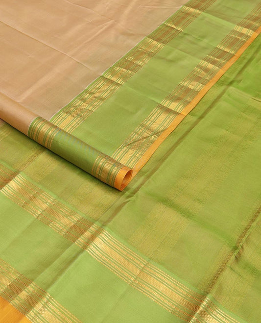 Sandal plain Kanchipuram silk saree, contrast rettai pettu border of rekku, rudraksham, banaras, and vanki designs, and zari design pallu