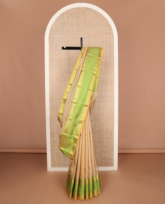 Sandal plain Kanchipuram silk saree, contrast rettai pettu border of rekku, rudraksham, banaras, and vanki designs, and zari design pallu