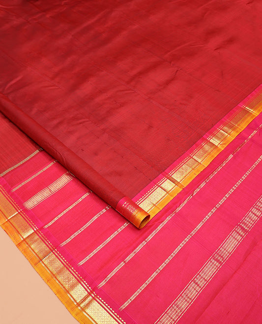 Maroon Plain Kanchipuram Silk Saree, Complemented by a Contrast One-Sided Border of Rekku, Banaras, and Mayil Kann Designs, Pallu of Zari Stripes, and Comes Without a Blouse